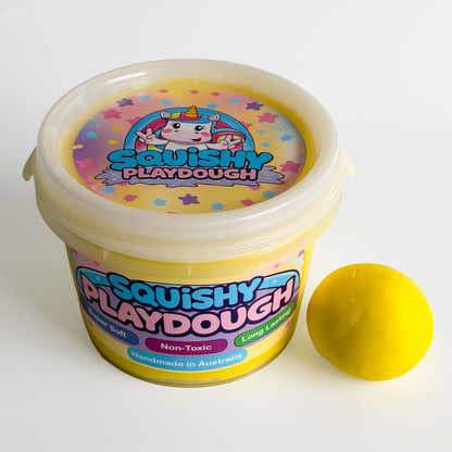 Yellow Playdough Tub 1kg. Handmade by Squishy Play. Super soft, non-toxic and long lasting. Perfect for sensory play, fine motor skill development and creative play.